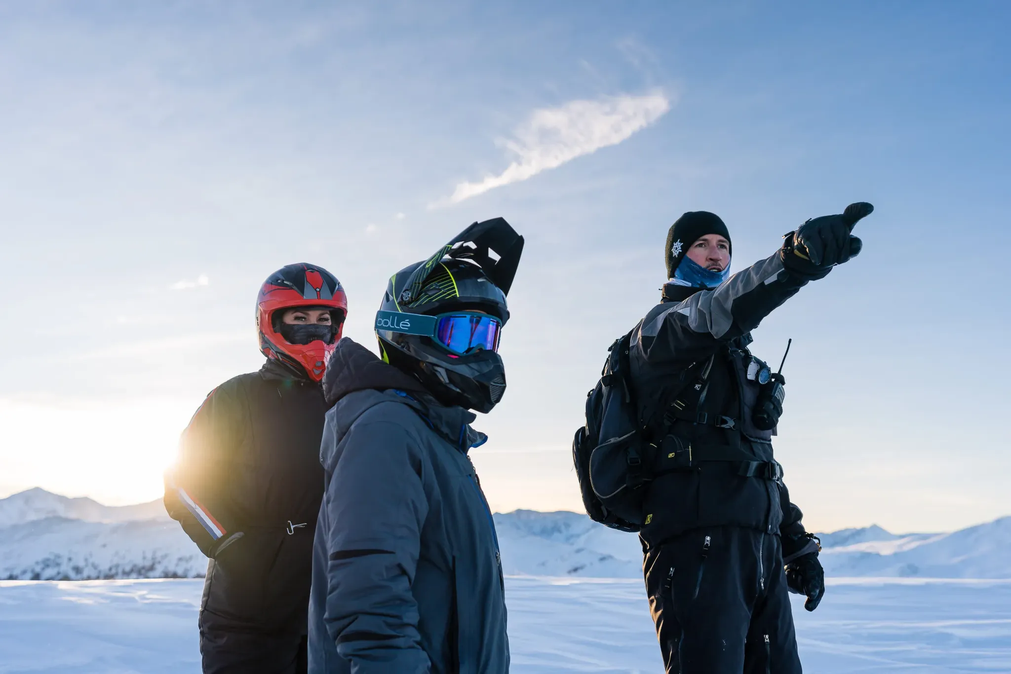 Group snowmobile tour guests exploring Colorado's backcountry near Denver